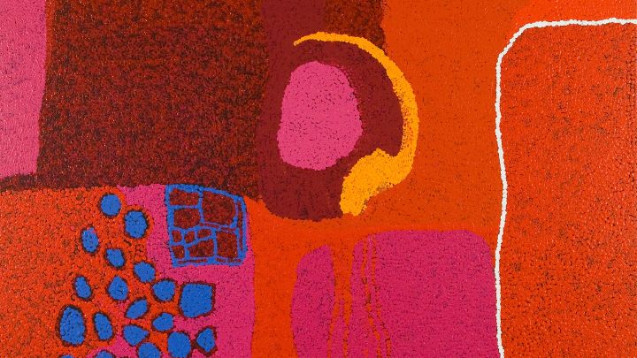 An abstract painting with an orange background and a white circle